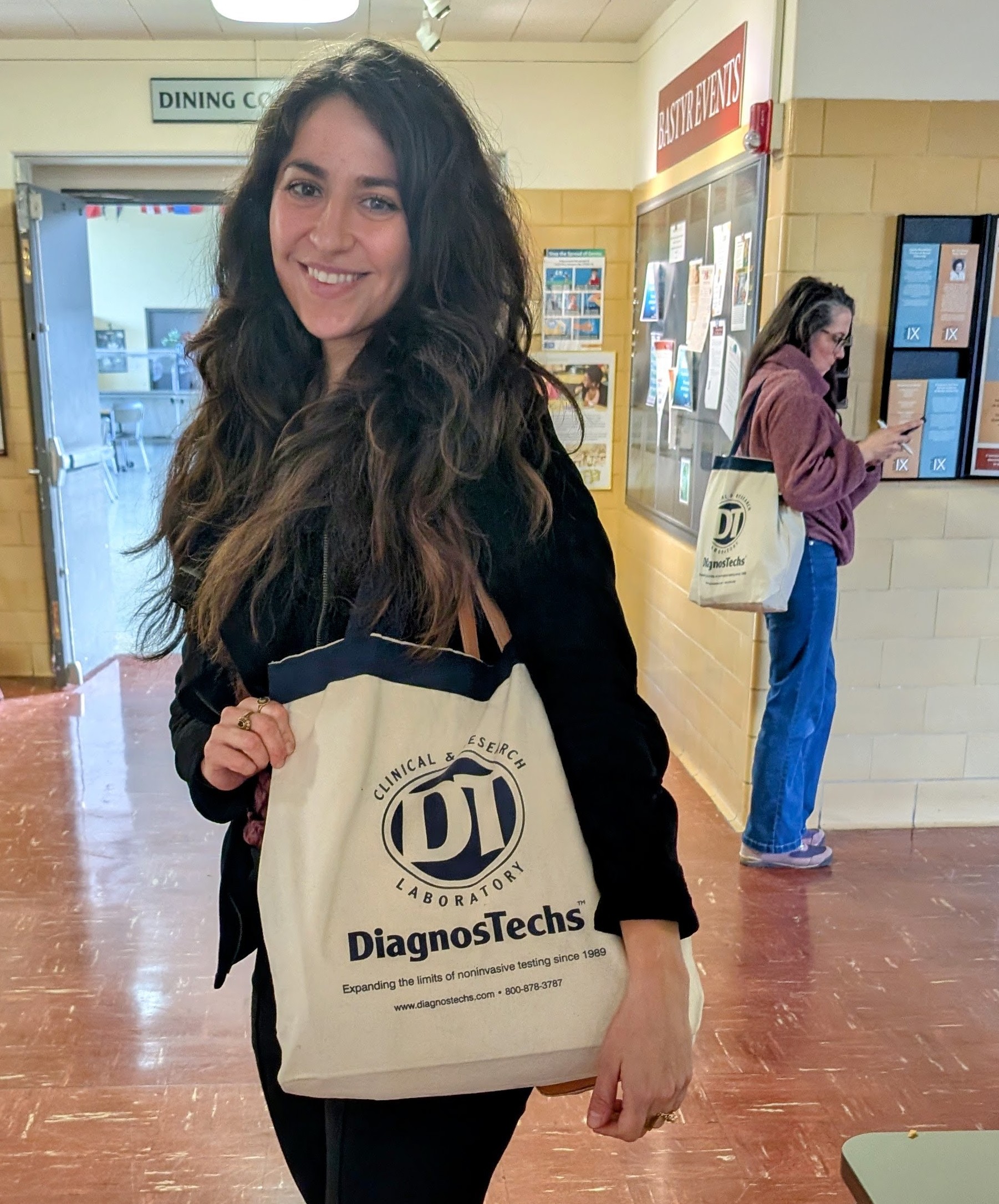 Bastyr Student with a Gifted DiagnosTechs Bag